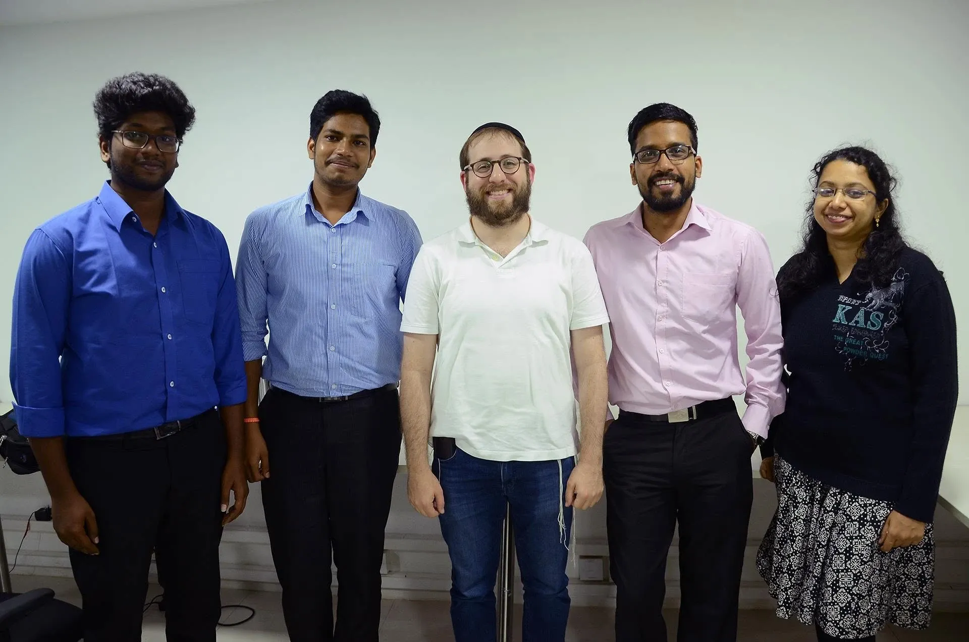 The Softway SEO team, with Danny Gavin, the SEO director, in the middle and Rahul beside him in a sky-blue striped shirt